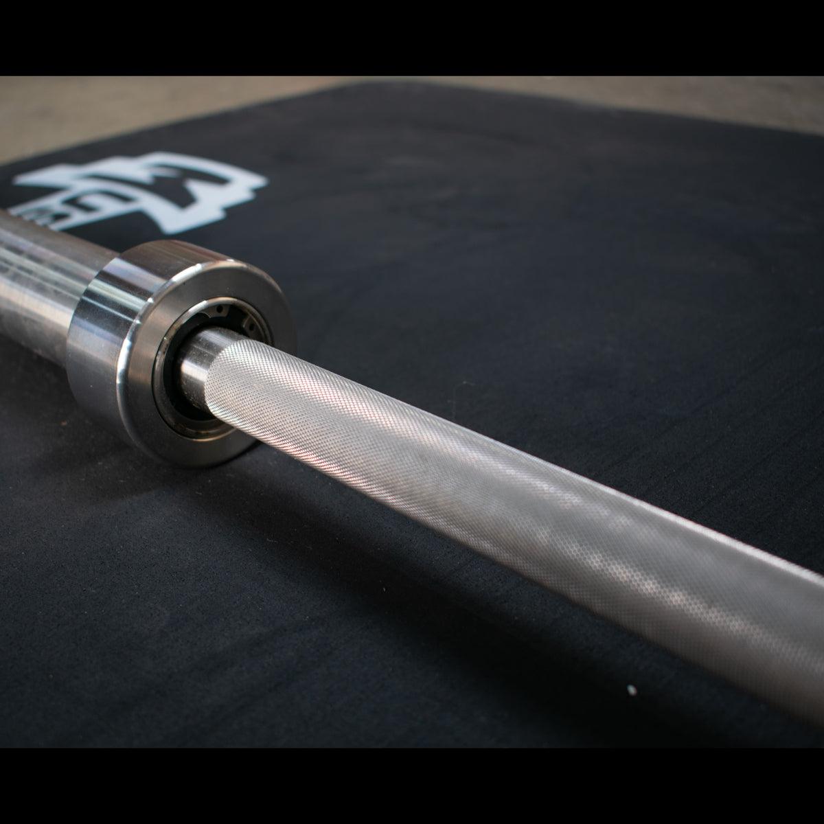 7' Stainless Steel Olympic Bar - Bearing - Muscle D Fitness - Qualiity Knurling